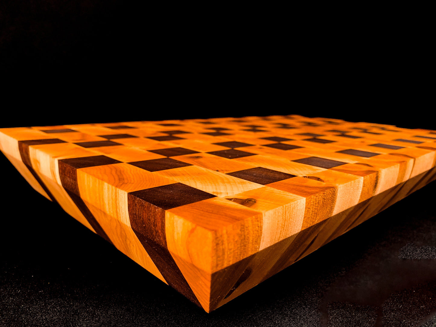 Stunning maple and walnut cutting board in checkerboard pattern. Pictured is medium sized 22x18x2